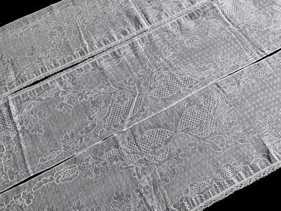 A border in drawn and embroidered threads,...