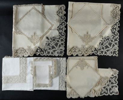 Four table services, bobbin lace surround,...