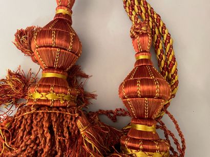 Three sets of cabled tassel tiebacks, two...