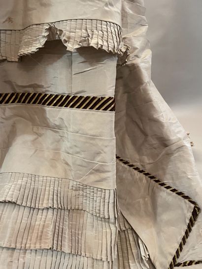 Meeting of elements of dresses in silks,...