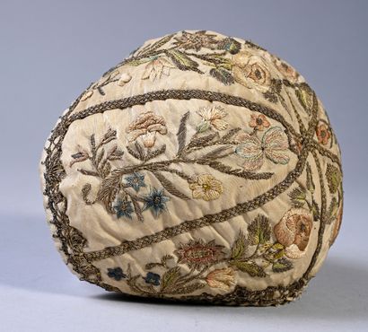 Embroidered bonnet of newborn, second third...