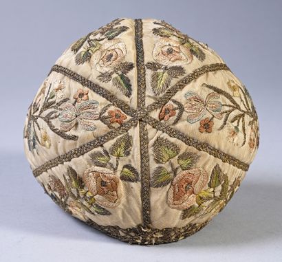 Embroidered bonnet of newborn, second third...