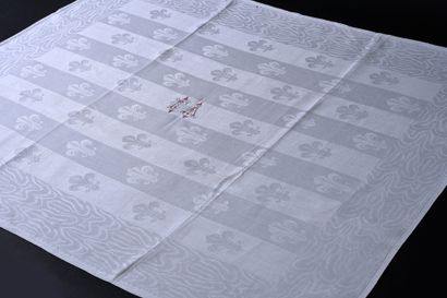 Table service with royal lilies in linen...