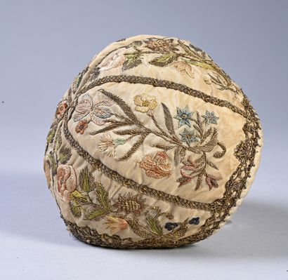 Embroidered bonnet of newborn, second third...