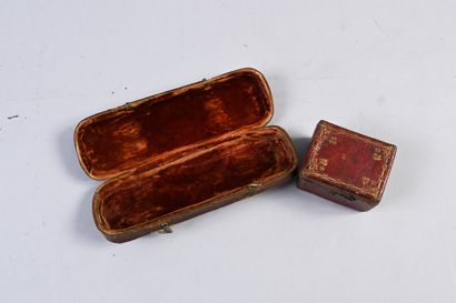 Two boxes in gilt leather with small irons,...