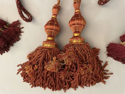Three sets of cabled tassel tiebacks, two...