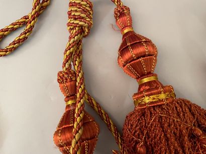 Three sets of cabled tassel tiebacks, two...