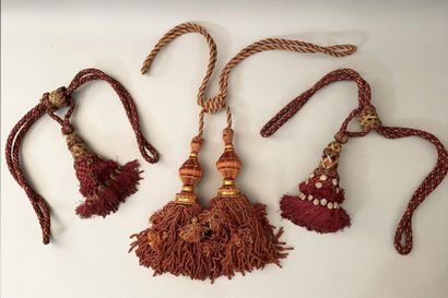 Three sets of cabled tassel tiebacks, two...