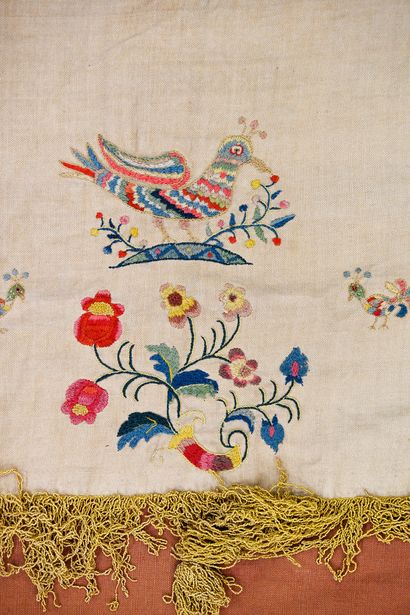 Embroidered valance, mounted as a wall hanging,...