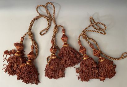 Three sets of cabled tassel tiebacks, two...