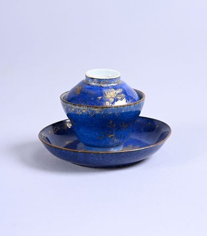 Porcelain covered tea bowl and stand with...