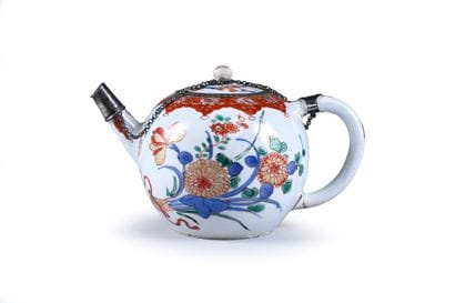 Porcelain teapot decorated in green family...