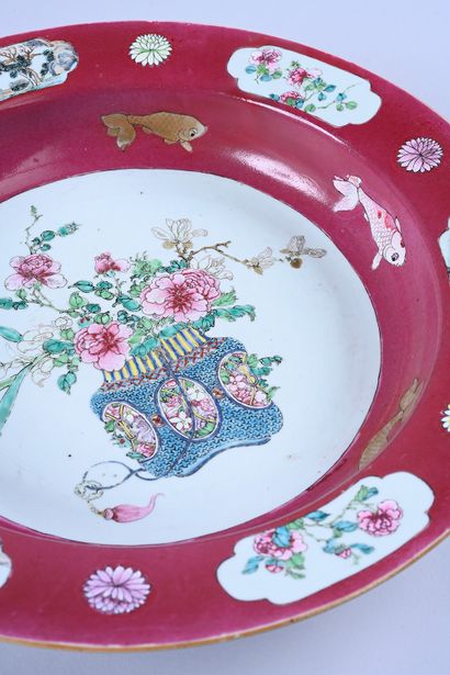 Large porcelain basin with ruby background...