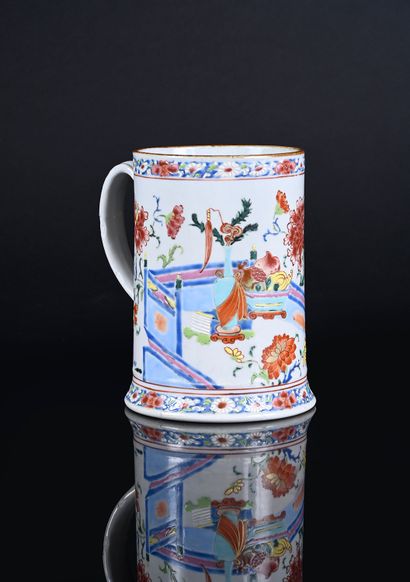 Porcelain tankard decorated in famille rose...