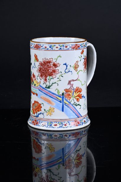 Porcelain tankard decorated in famille rose...