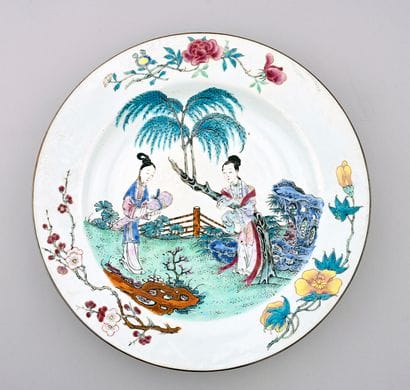 Two large dishes decorated with young women.
China....
