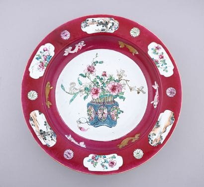 Large porcelain basin with ruby background...