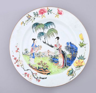 Two large dishes decorated with young women.
China....