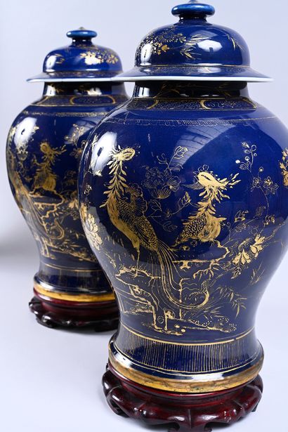 Two large covered vases in powder blue porcelain....
