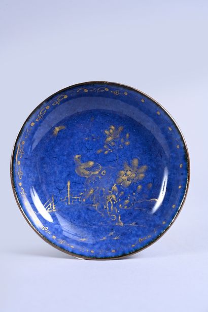 Porcelain covered tea bowl and stand with...