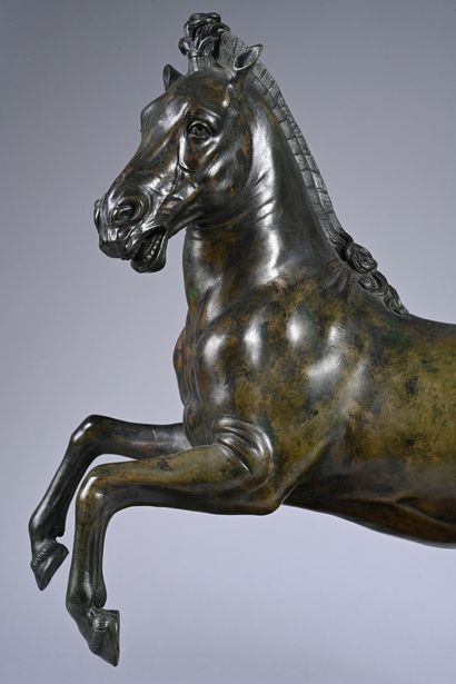 Prancing horse in bronze with brown and green...