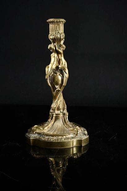 Torch in chased and gilded bronze, the twisted...