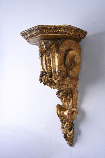 Pair of carved and gilded wood wall brackets...