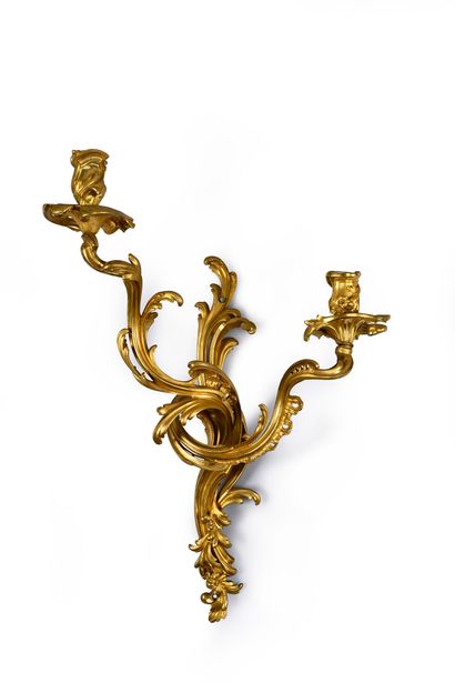 Suite of four large sconces in 
chased and...