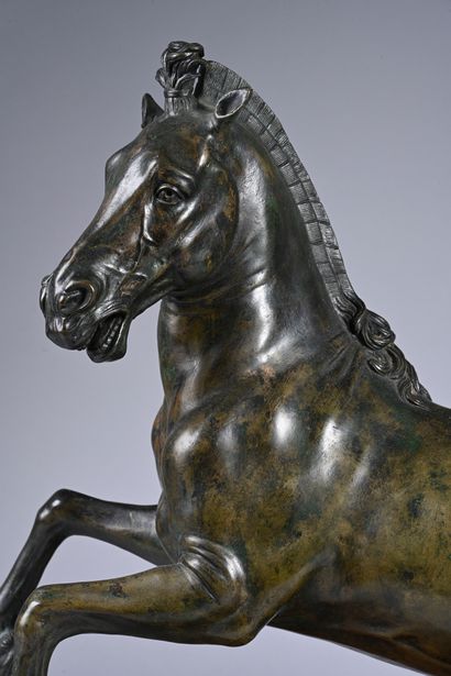 Prancing horse in bronze with brown and green...