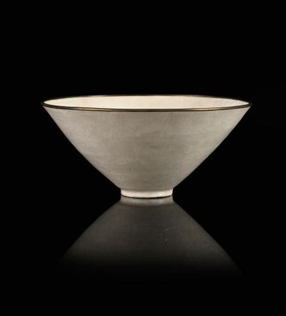 CHINA, Song Dynasty
Stoneware bowl, dingyao
Mounted...