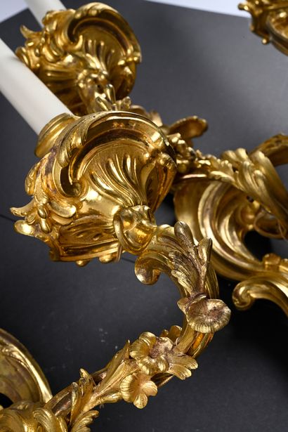 A pair of ormolu sconces with two asymmetrical...