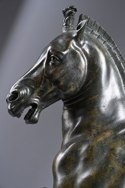 Prancing horse in bronze with brown and green...