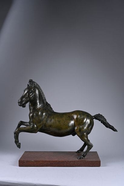 Prancing horse in bronze with brown and green...
