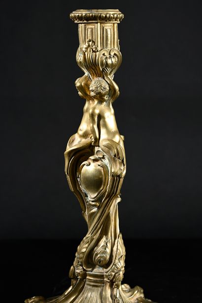 Torch in chased and gilded bronze, the twisted...