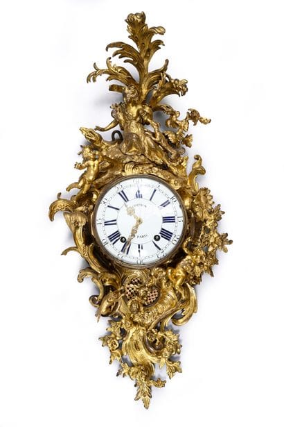 Large ormolu cartel and barometer with asymmetrical...