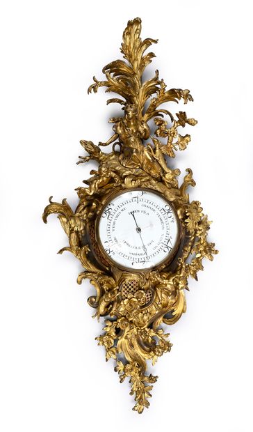 Large ormolu cartel and barometer with asymmetrical...