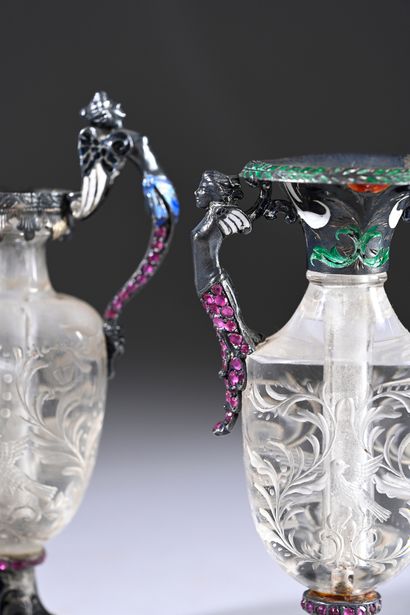 Two cut rock crystal vases with scrolls and...