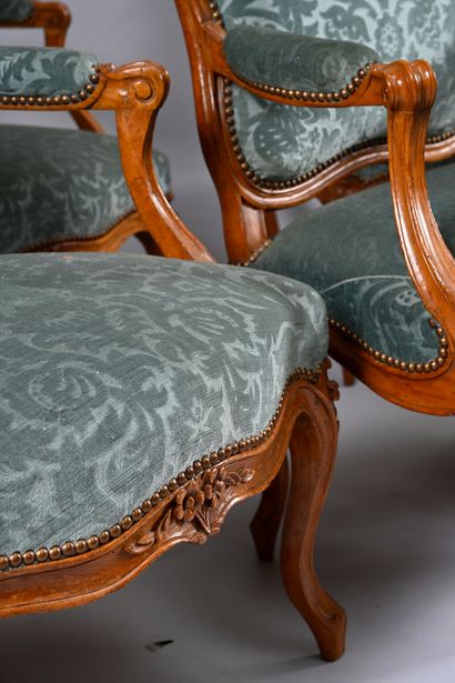 Suite of five armchairs in molded and carved...