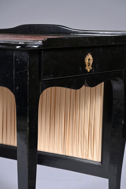 Screen-shaped writing table in blackened...