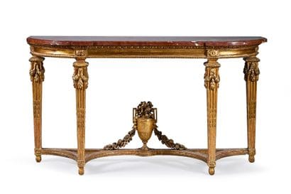 Carved and gilded wood console decorated...