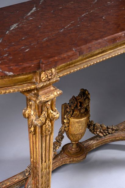 Carved and gilded wood console decorated...