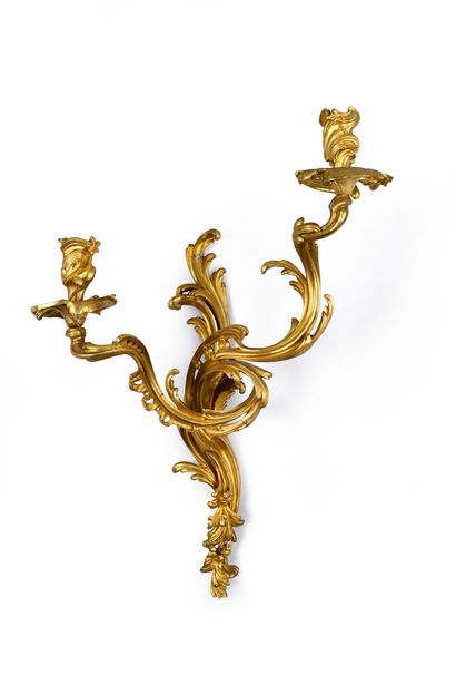 Suite of four large sconces in 
chased and...