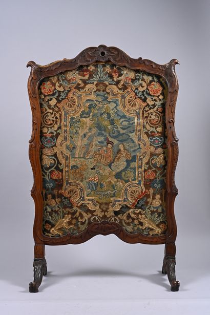 Molded and carved wood mantel screen 
decorated...