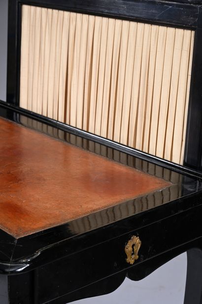 Screen-shaped writing table in blackened...