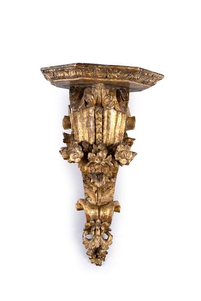 Pair of carved and gilded wood wall brackets...