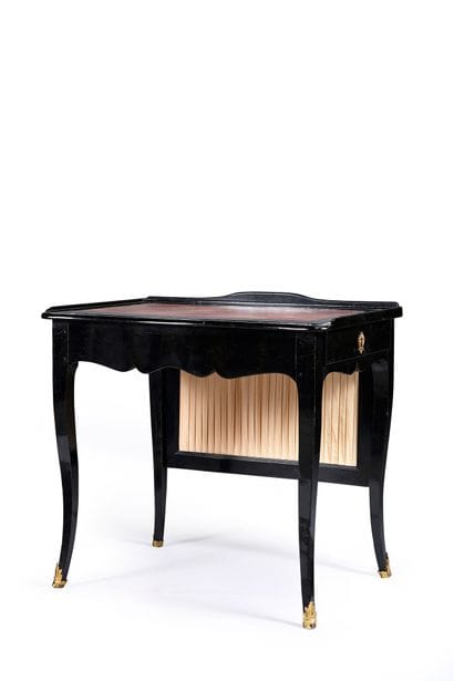 Screen-shaped writing table in blackened...