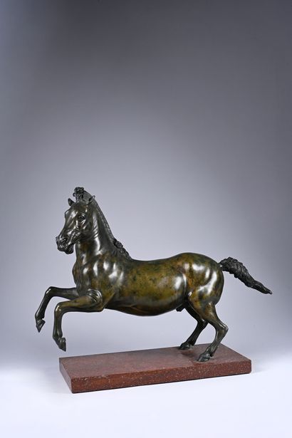 Prancing horse in bronze with brown and green...