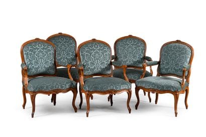 Suite of five armchairs in molded and carved...