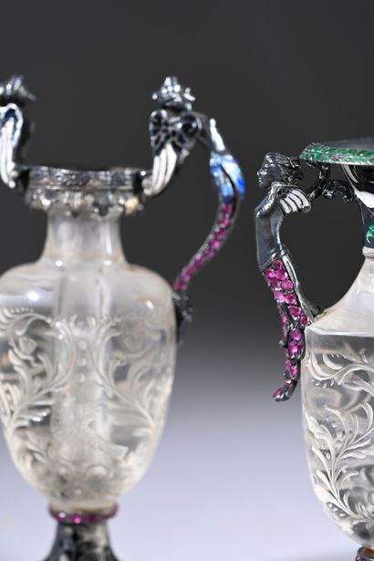 Two cut rock crystal vases with scrolls and...