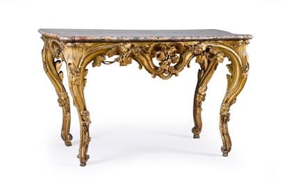 Carved, molded and gilded wood console 
and...